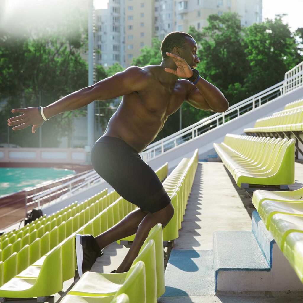 side-view-of-a-muscular-healthy-african-man-athlet-PEAZK4D.jpg